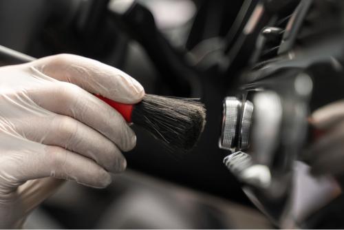 Owner receiving car keys from showroom team